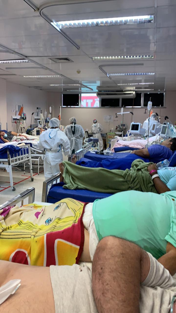 Imagens de enfermarias lotadas e pacientes nos corredores revelam a realidade do avanço da Covid-19 no AM